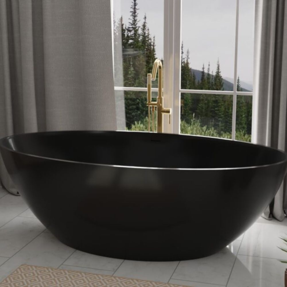 A large oval freestanding bathtub in glossy black, positioned in front of a window with a gold faucet, set in a modern bathroom with gray curtains and tiled flooring.