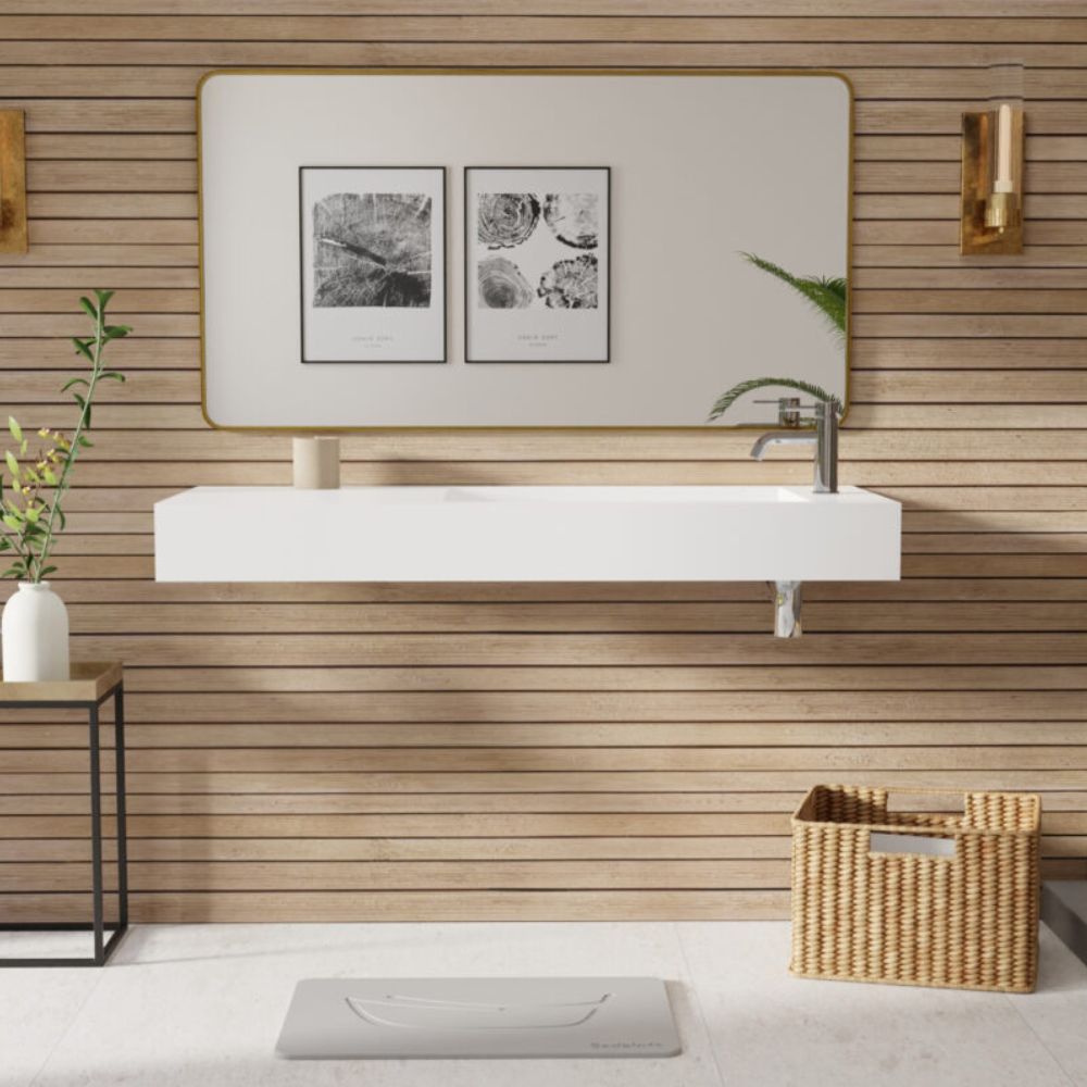 Bathroom with wooden wall, white sink, and decorative elements