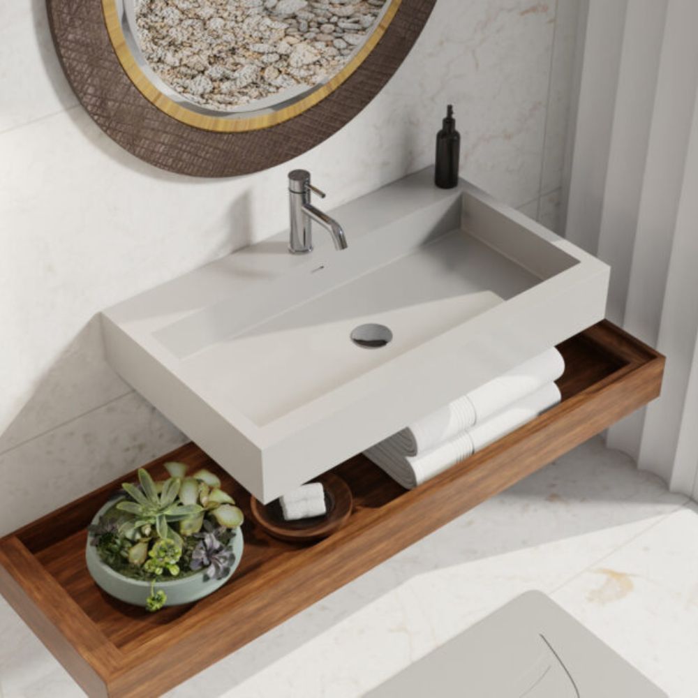 Bathroom vanity with sink, wooden shelf, and decorative items.