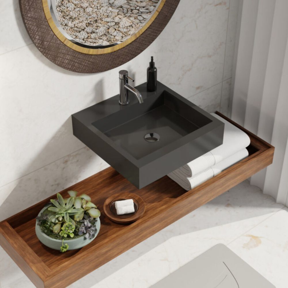 Bathroom setup with a black sink, wooden shelf, and decorative elements.