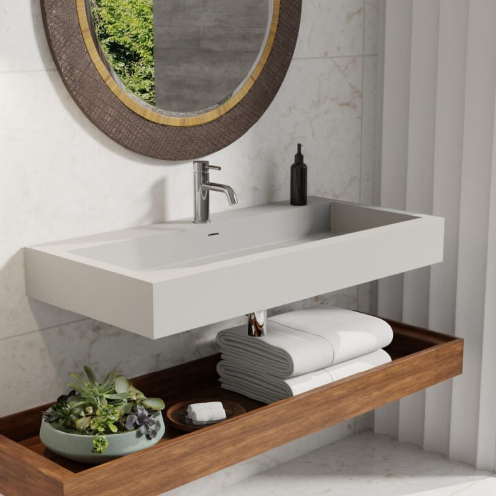 Bathroom vanity with sink, mirror, and wooden shelf.