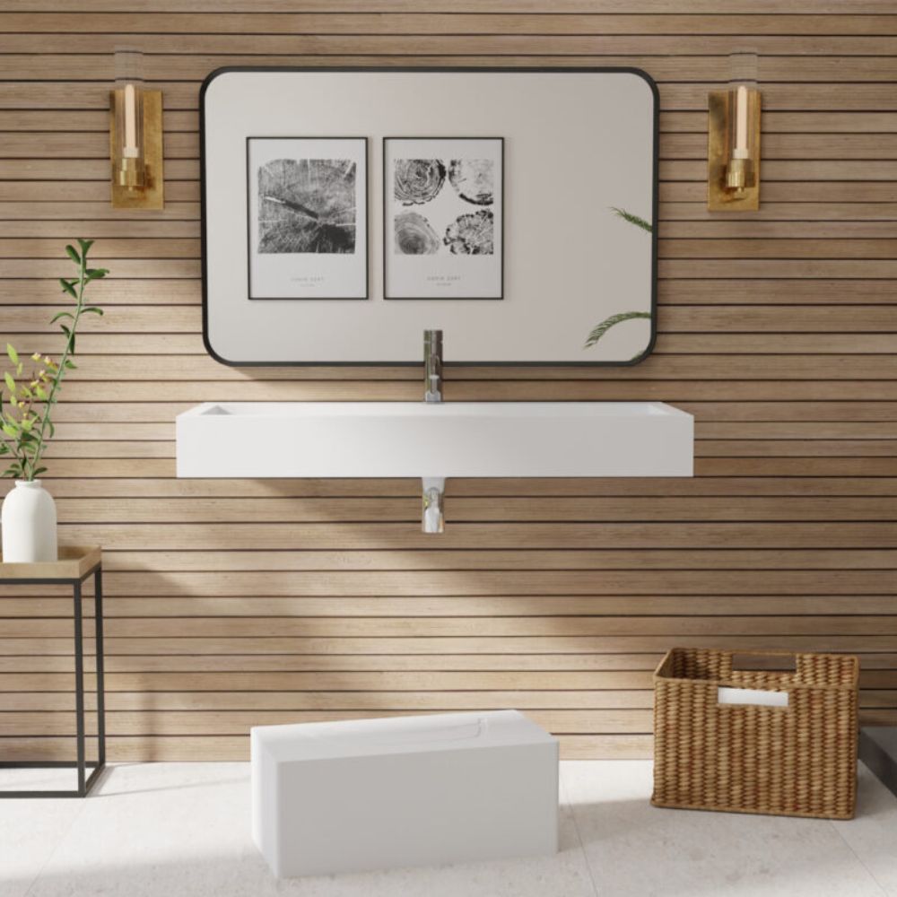 Bathroom with wooden wall, white sink, and decorative elements