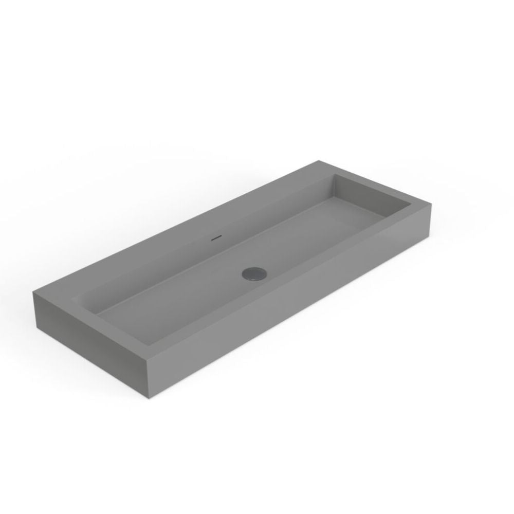 A minimalist rectangular wall-mounted sink in a solid medium gray finish, shown from an elevated perspective on a clean white background.
