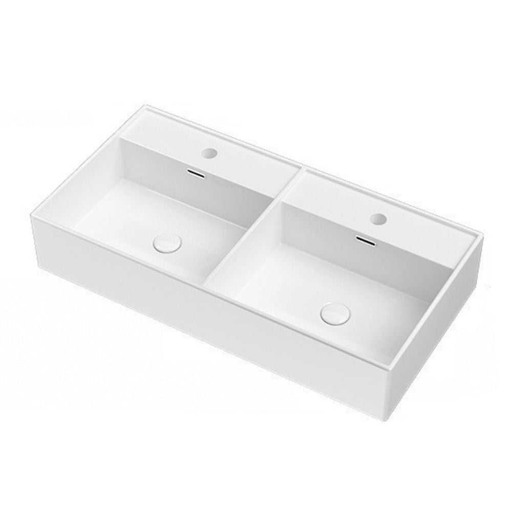 White ceramic double sink on a white background