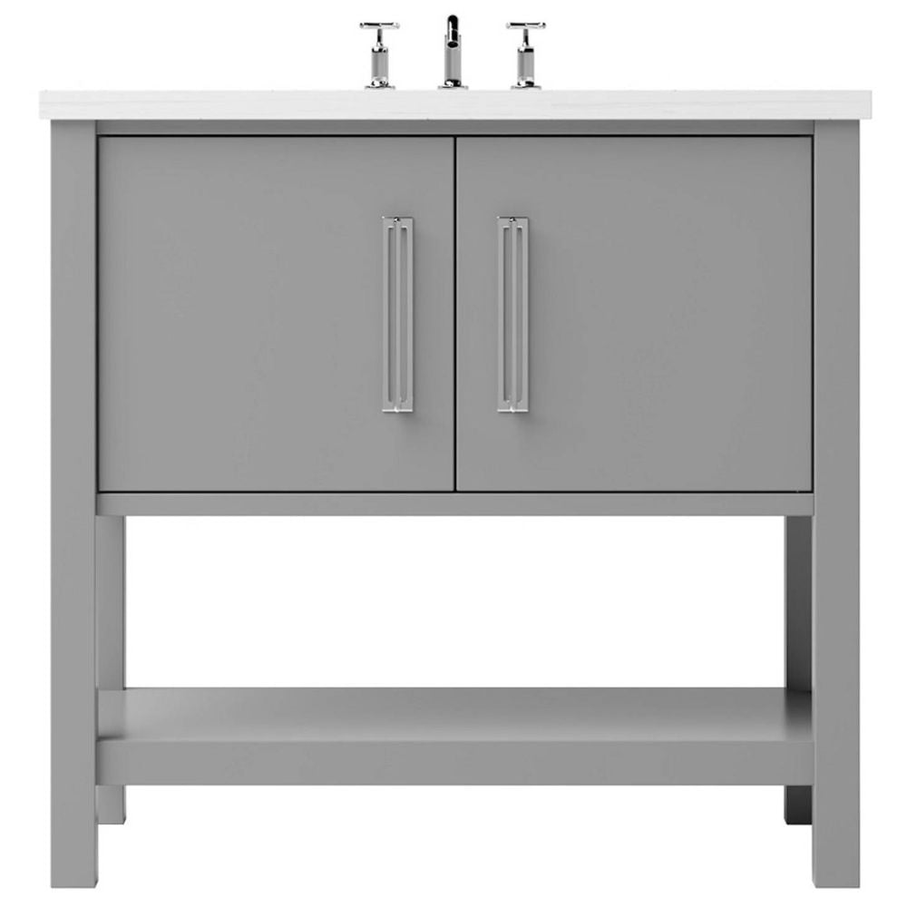 Bathroom vanity with two doors, gold handles, and a white countertop on a white background