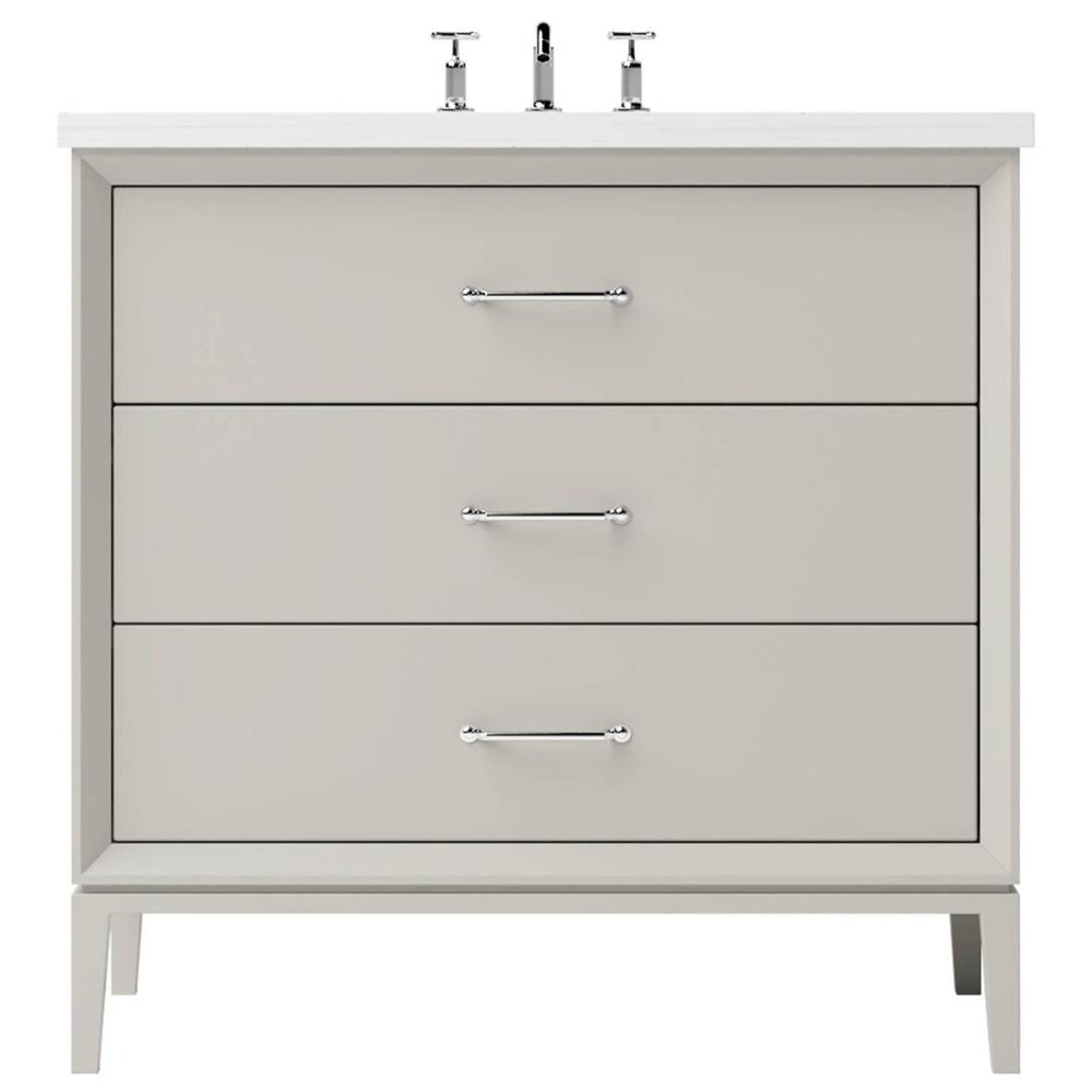 Gray bathroom vanity with three drawers and a white countertop on a white background