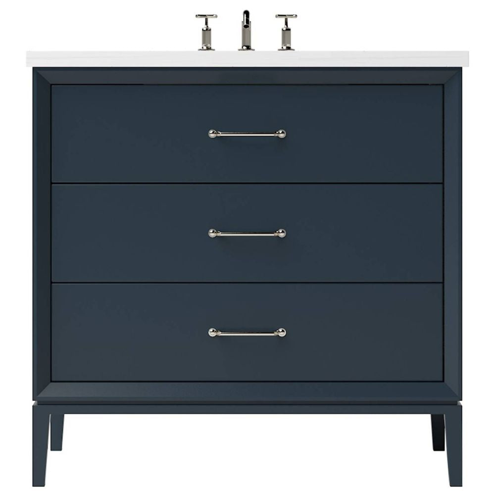 Navy blue vanity with three drawers and a white countertop on a white background
