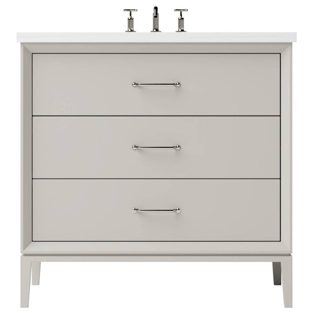 Bathroom vanity with three drawers and a white countertop on a white background