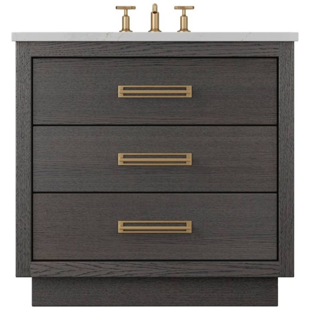 Bathroom vanity with three drawers, gold handles, and a white countertop.