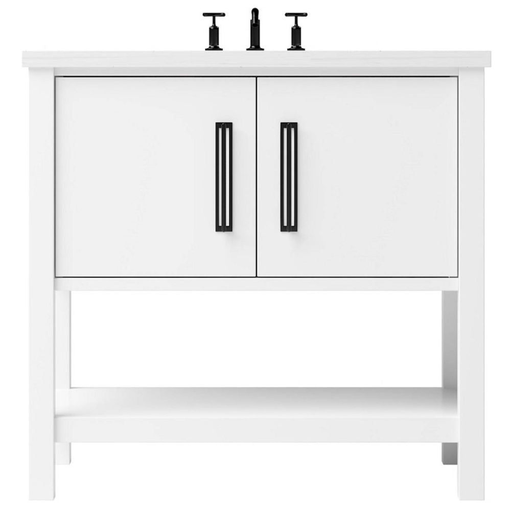White bathroom vanity with black handles on a white background
